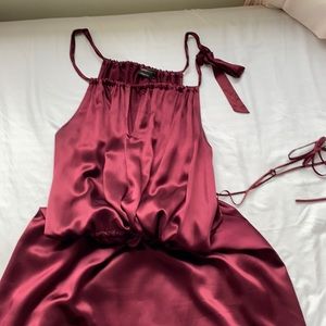 100% a silk BCBG Burgandy Drawstring Dress.